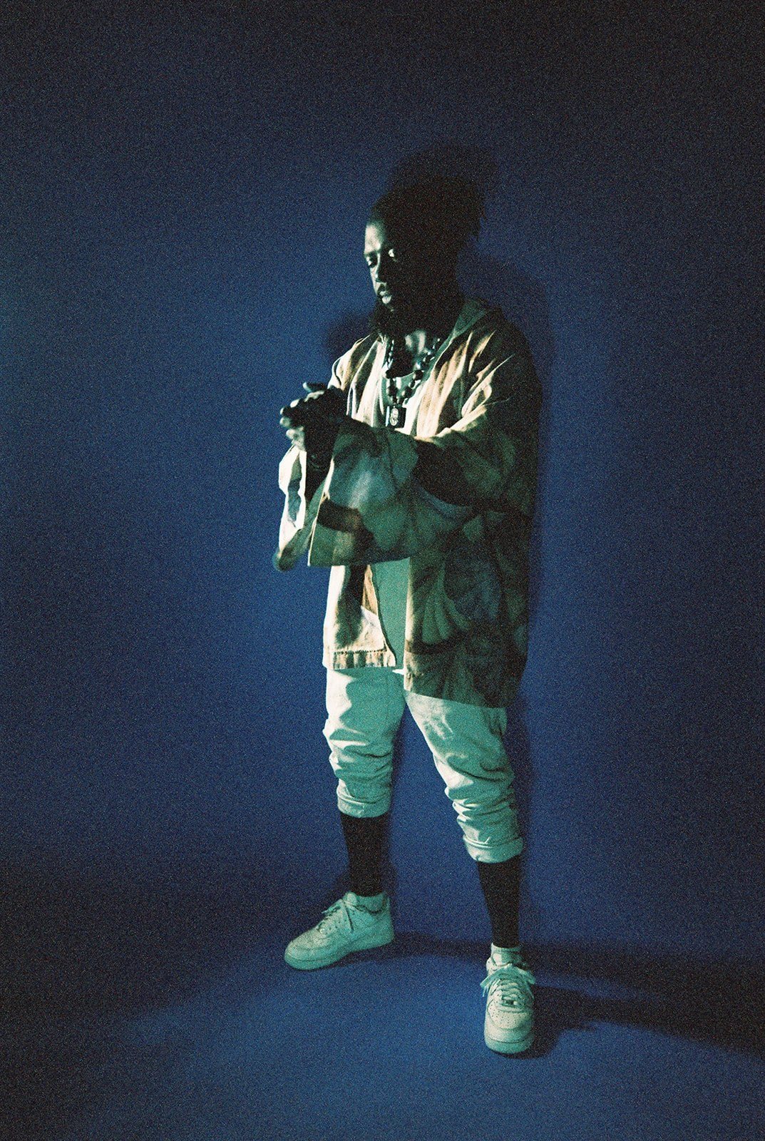 Franz Von, full-length portrait on blue