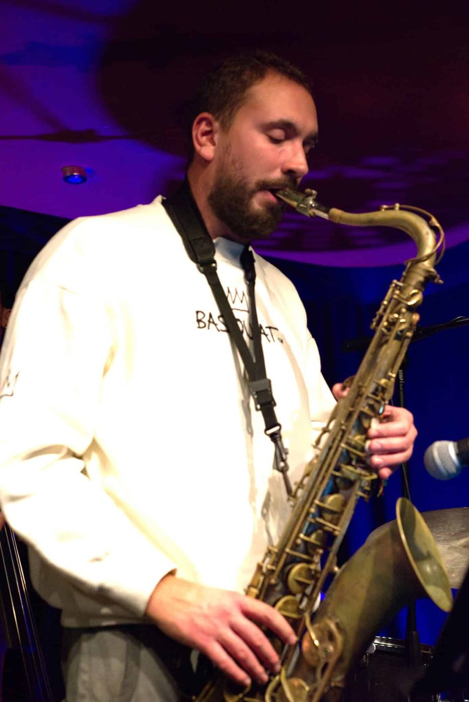Saxophonist on stage with Jackson Mathod